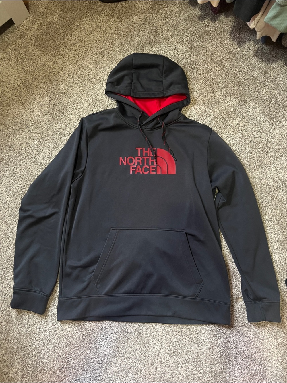 The North Face Men’s Black Hoodie with Red Logo and Lined Hood
